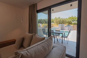 TV - DaMa Maisonettes  by RentalsPro-Polychrono (Paliouri)