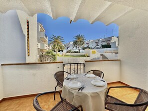 Outdoor dining - Cozy Apartment with Pool and Terrace in Puig Rom, 2km from Roses Beach - Sleeps 4 (Roses)