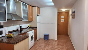Appartement | Cuisine privée | Chaise haute