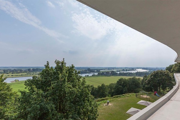 Soak in sweeping valley views from the curved terrace.