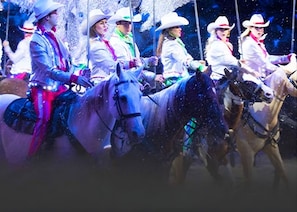 A group of people on horseback, dressed in western attire, with a festive atmosphere. - Two Bedroom, Two bathroom Condo in Pigeon Forge| Near Dollywood| Sleeps 6 (Pigeon Forge)