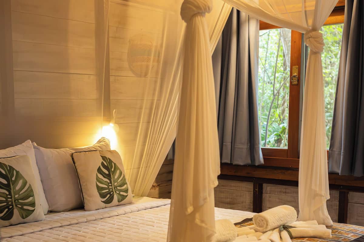 Chalé conforto, vista para o jardim | Comodidades do quarto