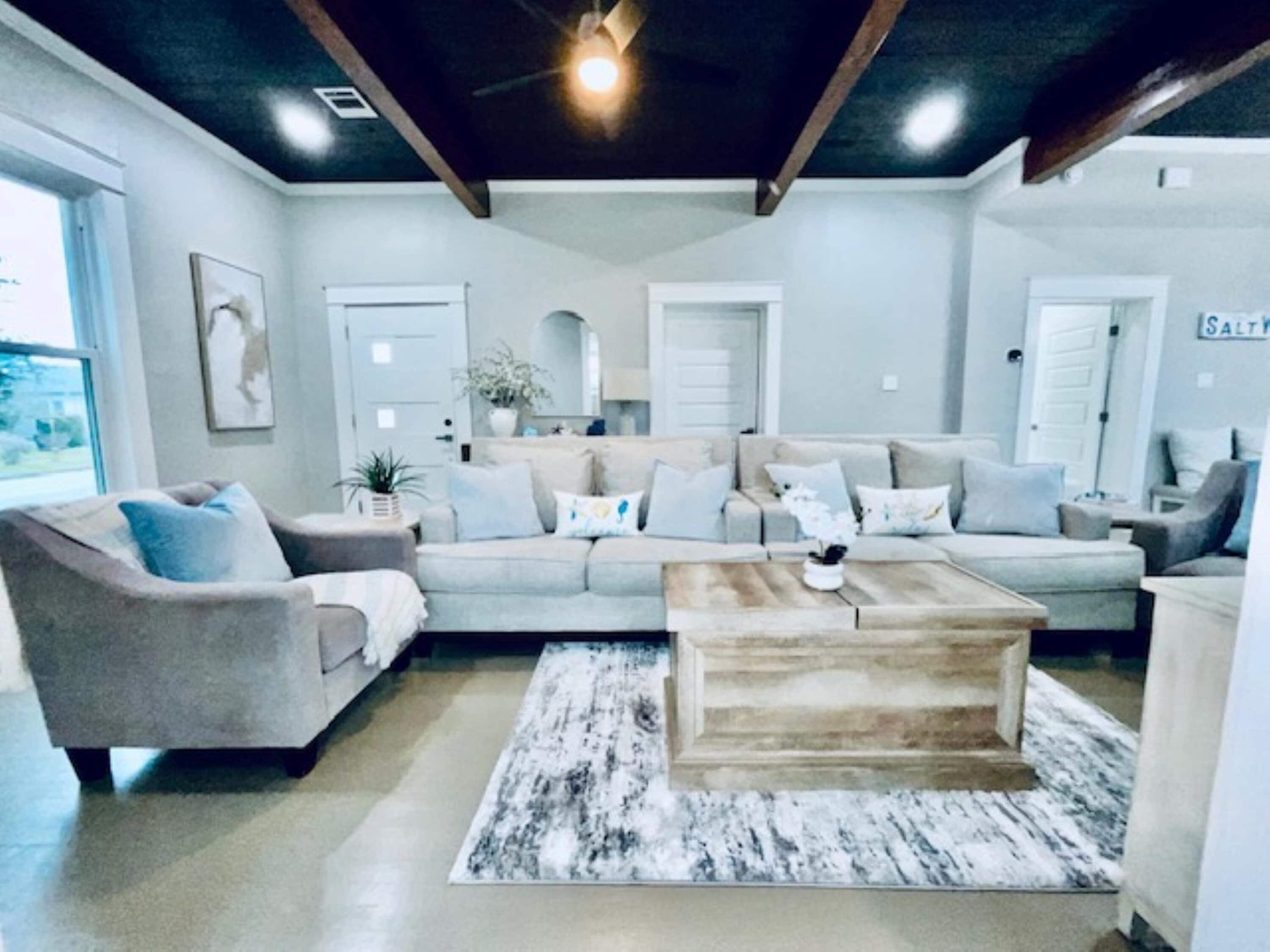 Casa, várias camas, varanda, vista para o jardim (Coastal Cove) | Área de estar