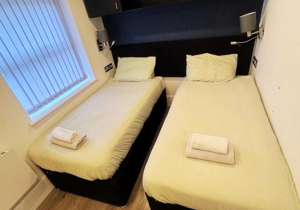 Chambre Économique avec lits jumeaux, non-fumeurs, salle de bains privée