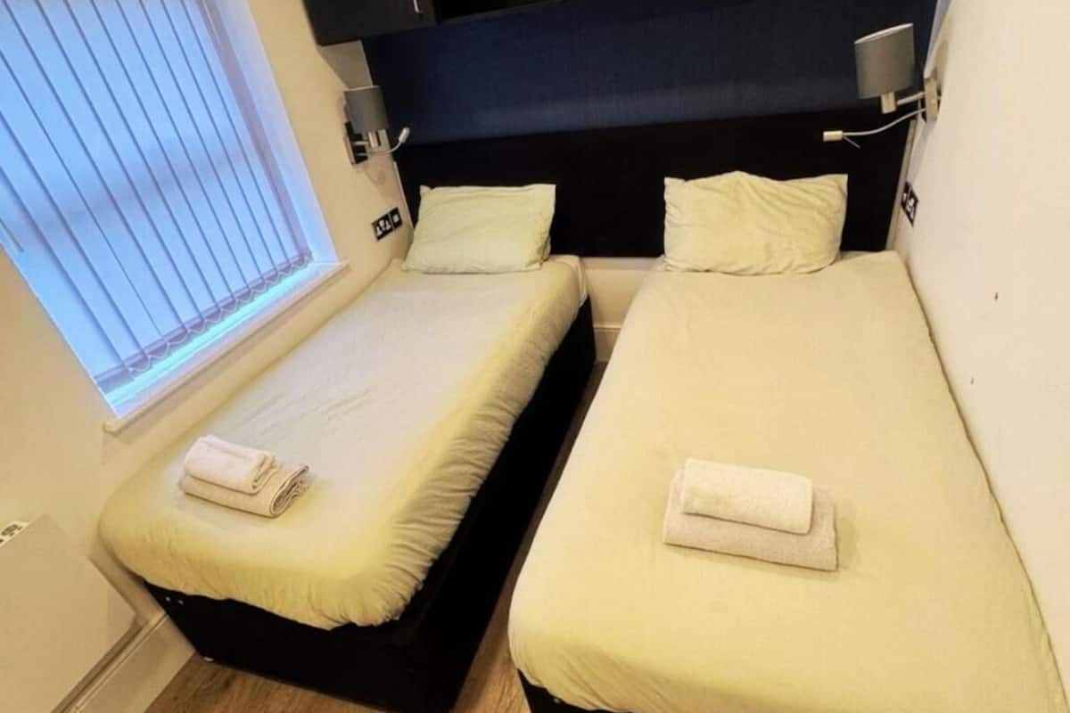 Chambre Économique avec lits jumeaux, non-fumeurs, salle de bains privée