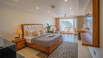 Luxury Suite, Balcony, Mountain View | Premium bedding, laptop workspace, free WiFi