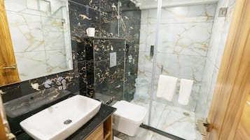 Luxury Suite, Balcony, Mountain View | Bathroom | Shower, hair dryer, towels, soap