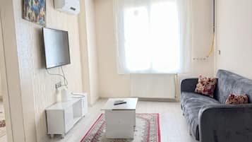 Comfort-lejlighed - udsigt til have | Opholdsområde