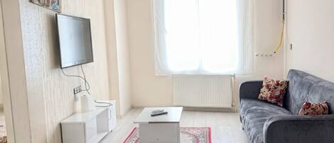 Appartement Confort, vue sur le jardin | Aire de séjour