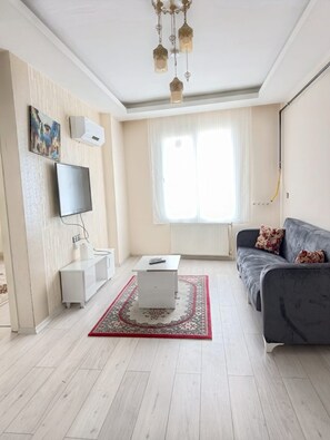 Apartamento Confort, vistas al jardín | Zona de estar