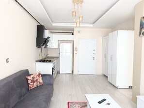 Comfort Apartment, Garden View | Living area
