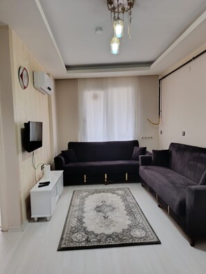 Comfort-lejlighed - udsigt til have | Opholdsområde