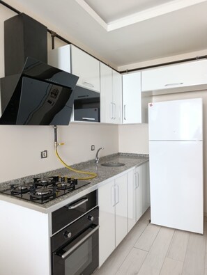 Comfort Apartment, Garden View | Private kitchen