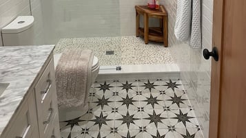 Hair dryer, towels, soap, shampoo