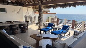 Outdoor dining - Two Bedroom Penthouse Palapa Ocean View (Puerto Escondido)