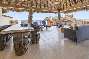 Outdoor dining - Two Bedroom Penthouse Palapa Ocean View (Puerto Escondido)
