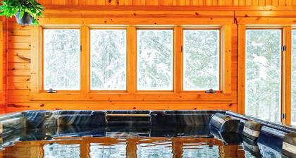 Creekside Chalet | Largest Hot Tub in Western UP