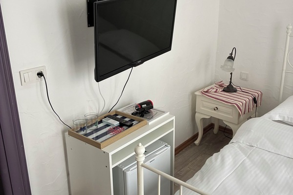 Economy Double Room, City View | Desk, WiFi (free), bed sheets