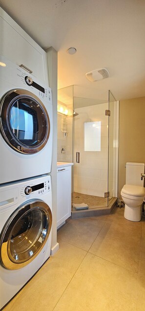 Hair dryer, towels, soap, toilet paper