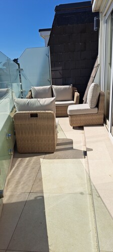 Beach Front Apartment bright spacious living area with balcony and parking