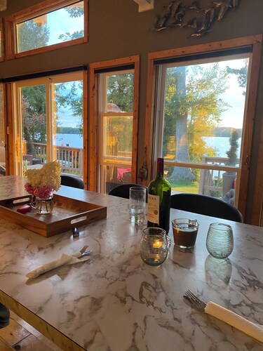 Island retreat on Rice Lake with sunset views, fire pit and fully fenced yard.