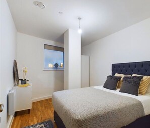 2 dormitorios, tabla de planchar con plancha, wifi y ropa de cama