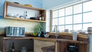 Suite superior, 2 habitaciones, vista al océano | Área de sala de estar