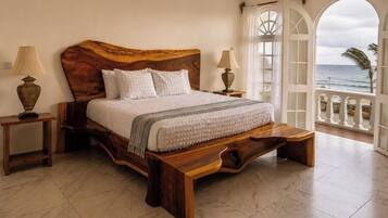 Luxury Room, 1 King Bed, Ocean View | In-room safe, desk, laptop workspace, blackout drapes