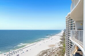 A beachfront hotel with a view of the ocean and beach. - NEW!  Beach Luxury ~ Turquoise Place C2203 ~ Balcony Hot Tub & TV! (Orange Beach)