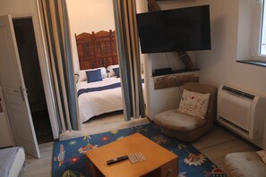 1 chambre, fer et planche à repasser, lit parapluie, Wi-Fi gratuit