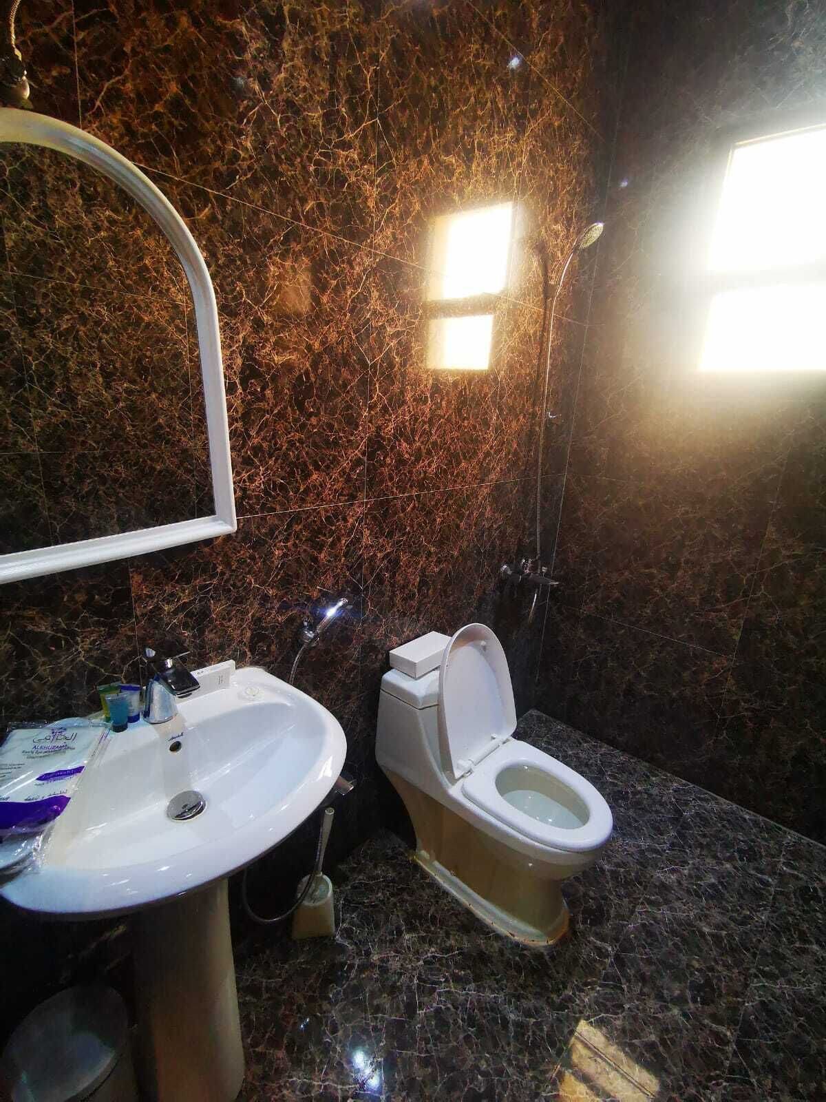 Shower, free toiletries, hair dryer, slippers