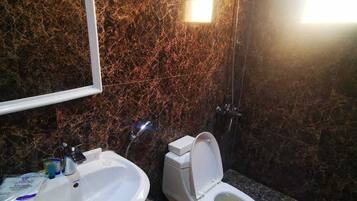 Shower, free toiletries, hair dryer, slippers