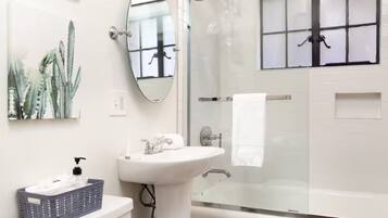 Hair dryer, towels, soap, toilet paper