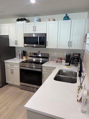 Private kitchen - NEW 2 bedroom, (queens)  1 bathroom VRBO, comfy & serene. “ASPEN’s Suite Escape” (Saskatoon)