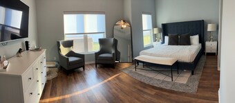 Stylish 4BR Hot Tub Retreat +Near Omaha + Garage + EV