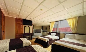 Deluxe Suite, Multiple Beds, Balcony, City View | Iron/ironing board, free WiFi - Hotel Ensueños by HHG (Cuenca)