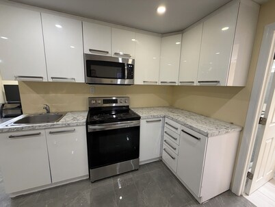 Two Bedrooms Basement Apartment - Heartland Area
