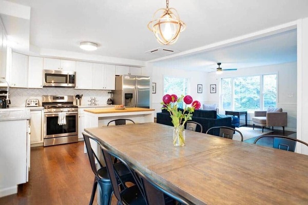 Enjoy the open layout design of the dining, kitchen, and living rooms