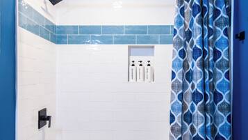 Hair dryer, towels, soap, shampoo