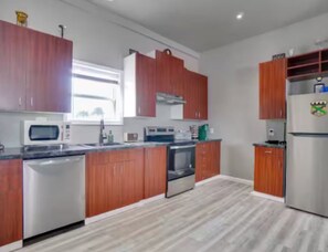 Private kitchen - 3 Bedroom Throwback Military Base Themed Building (Fort Smith)