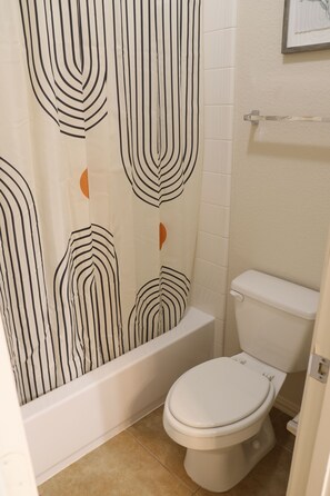 Hair dryer, towels, soap, toilet paper