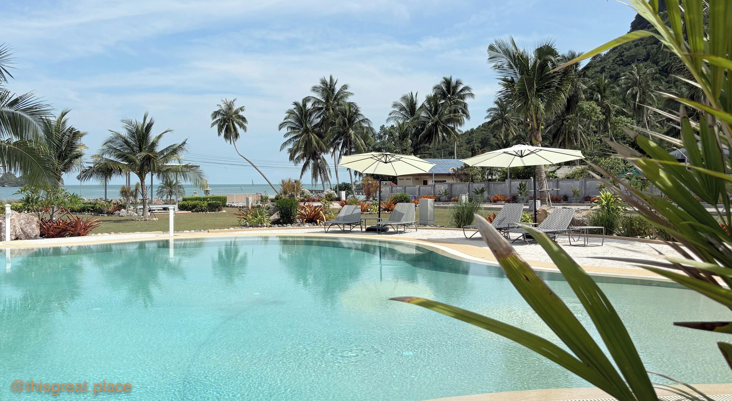 Outdoor pool, pool umbrellas, pool loungers