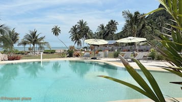 Outdoor pool, pool umbrellas, pool loungers