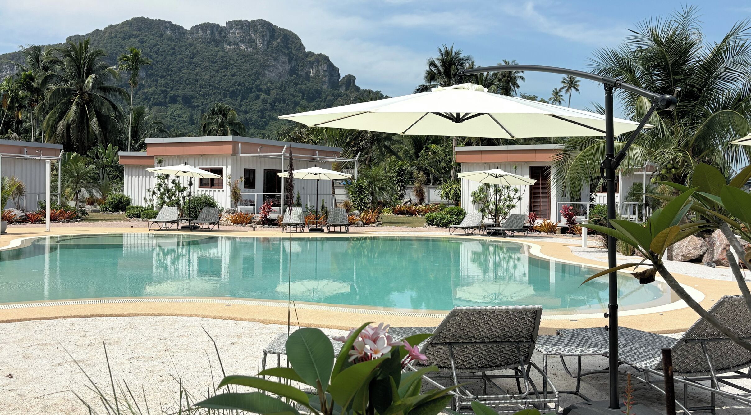 Outdoor pool, pool umbrellas, pool loungers