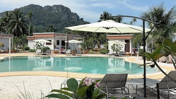 Outdoor pool, pool umbrellas, pool loungers