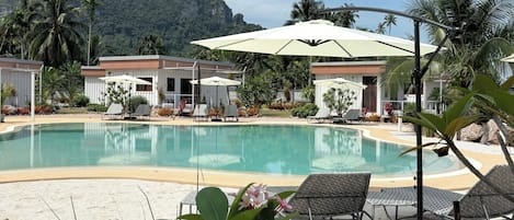 Outdoor pool, pool umbrellas, sun loungers