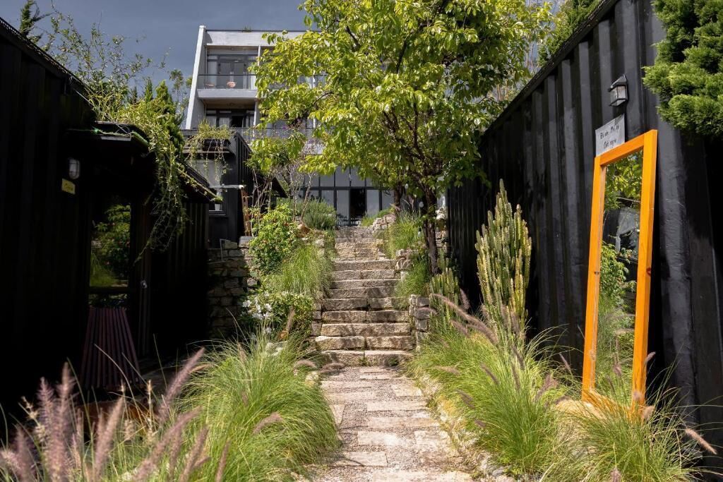 Deluxe Bungalow, Patio, Garden View | Property grounds