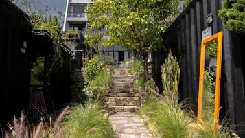 Deluxe Bungalow, Patio, Garden View | Property grounds