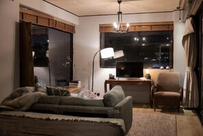 Penthouse Deluxe, balcon, vue jardin | Intérieur