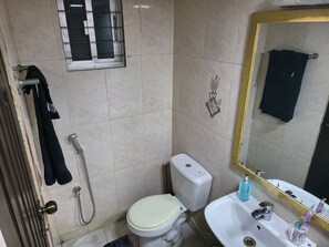 Shower, towels, soap, toilet paper